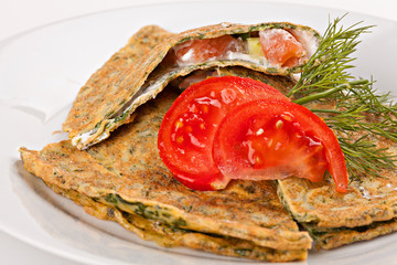 Zucchini pancakes, stuffed  vegetables and red fish