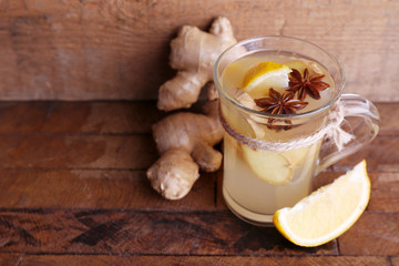 Cup of ginger drink with lemon