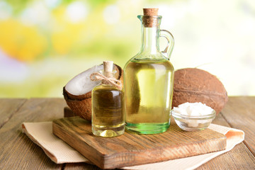 Coconut oil on table on light background