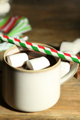 Hot chocolate with marshmallows, on wooden background