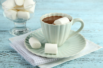 Hot chocolate with marshmallows in mug,