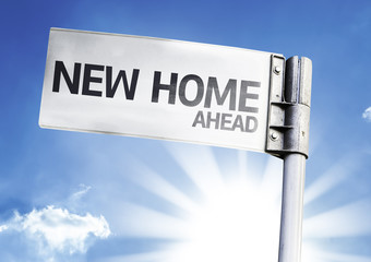 New Home written on the road sign