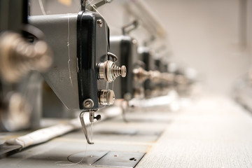 Abandoned textile factory - sewing machines - obrazy, fototapety, plakaty