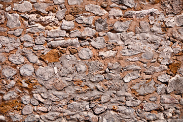 Old natural stone wall background texture