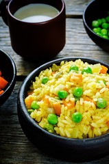 Indian vegetarian pilaf, Biriyani, with carrots and green peas