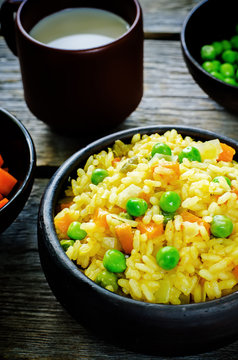 Indian vegetarian pilaf, Biriyani, with carrots and green peas