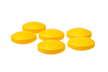 Heap of pills isolated on white background