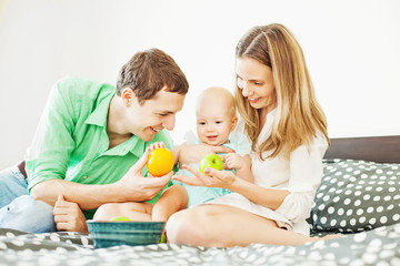 family on a bed