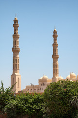 Fototapeta na wymiar El Mina Masjid Mosque Against Blue Sky