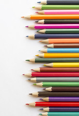 colored pencils on white background