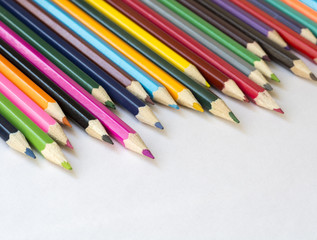 Сolored pencils on white background