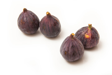 Fresh turkish figs isolated on a white studio background.