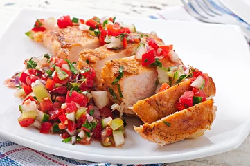 Poster Grilled chicken breast with fresh tomato salsa © timolina