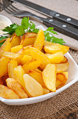 Fried potato wedges