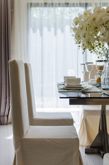 table set in white dinning room