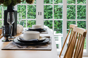 table set on brown wooden dinning table