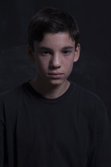 Fototapeta premium portrait of a sad and angry boy