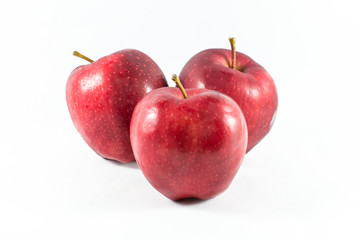 Fresh red apple on a white background
