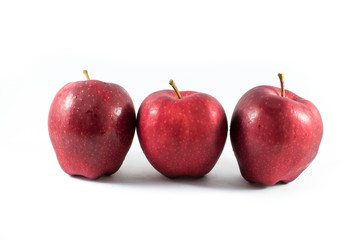 Fresh red apple on a white background