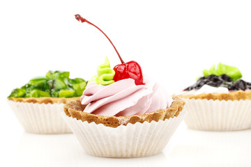 cake with cherry, kiwi fruit, currants and coffee