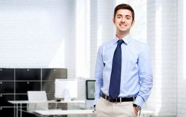 Fototapeta premium Smiling man in the office