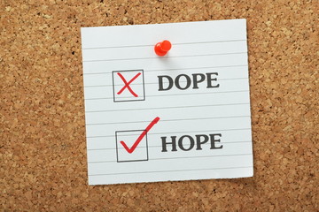 Hope Not Dope tick boxes on a cork notice board