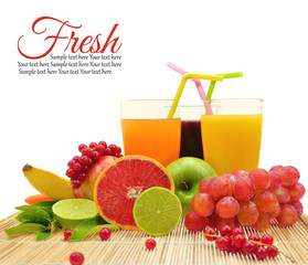 Fresh fruit and three glasses full of juice