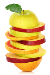 Fresh mixed slices of fruit in a row