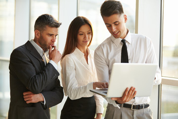 Business People working on a laptop. Team work