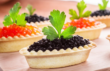 canape with red and black caviar