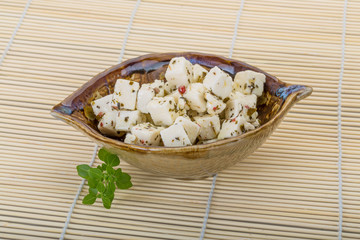 Cheese with spices and oil