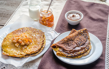 Pumpkin crepes with fruit confiture and chocolate cream