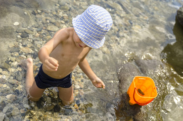 Beautiful kid playing as explorer