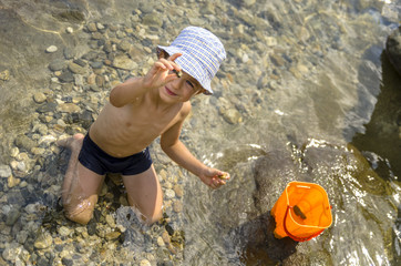 Beautiful kid playing as explorer
