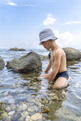 Beautiful kid playing as explorer