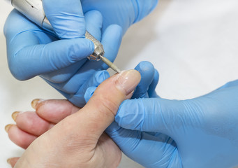 woman doing manicure beauty salon varnish wellness