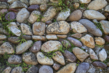 Old wall built with river stones