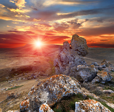 Fototapeta sunset with rocks