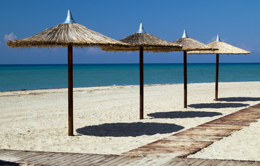 Umbrellas on perfect tropical beach