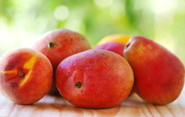Fototapeta na wymiar Peach, mango and pear fruits