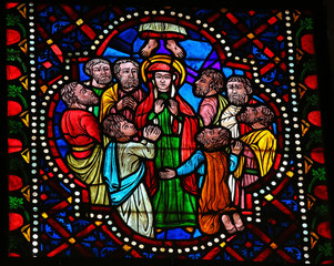 Fototapeta na wymiar Assumption of Mary - stained glass