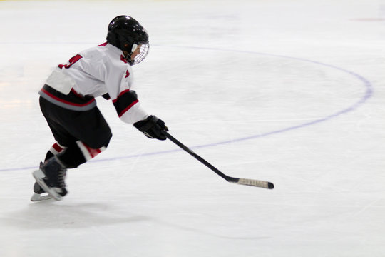 Child playing minor hockey