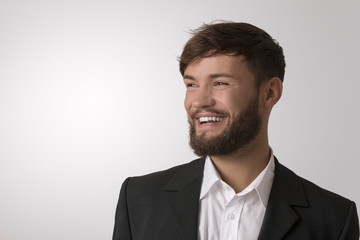 Happy young man with beard