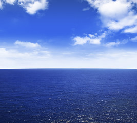 blue sea and clouds on sky