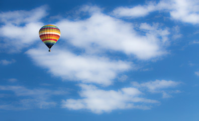 Hot air balloon over blue sky