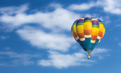 Hot air balloon over blue sky