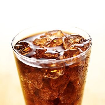 ice cold cola in glass cup