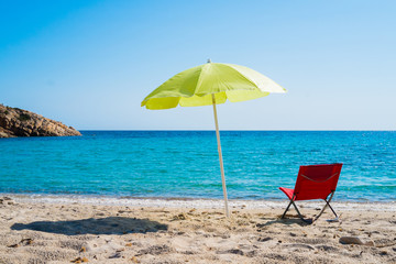 Beach umbrella and lounge chair