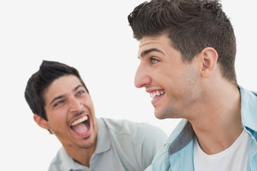 Side view of two excited soccer fans
