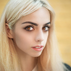 Fototapeta premium Portrait of a beautiful blonde girl close-up.